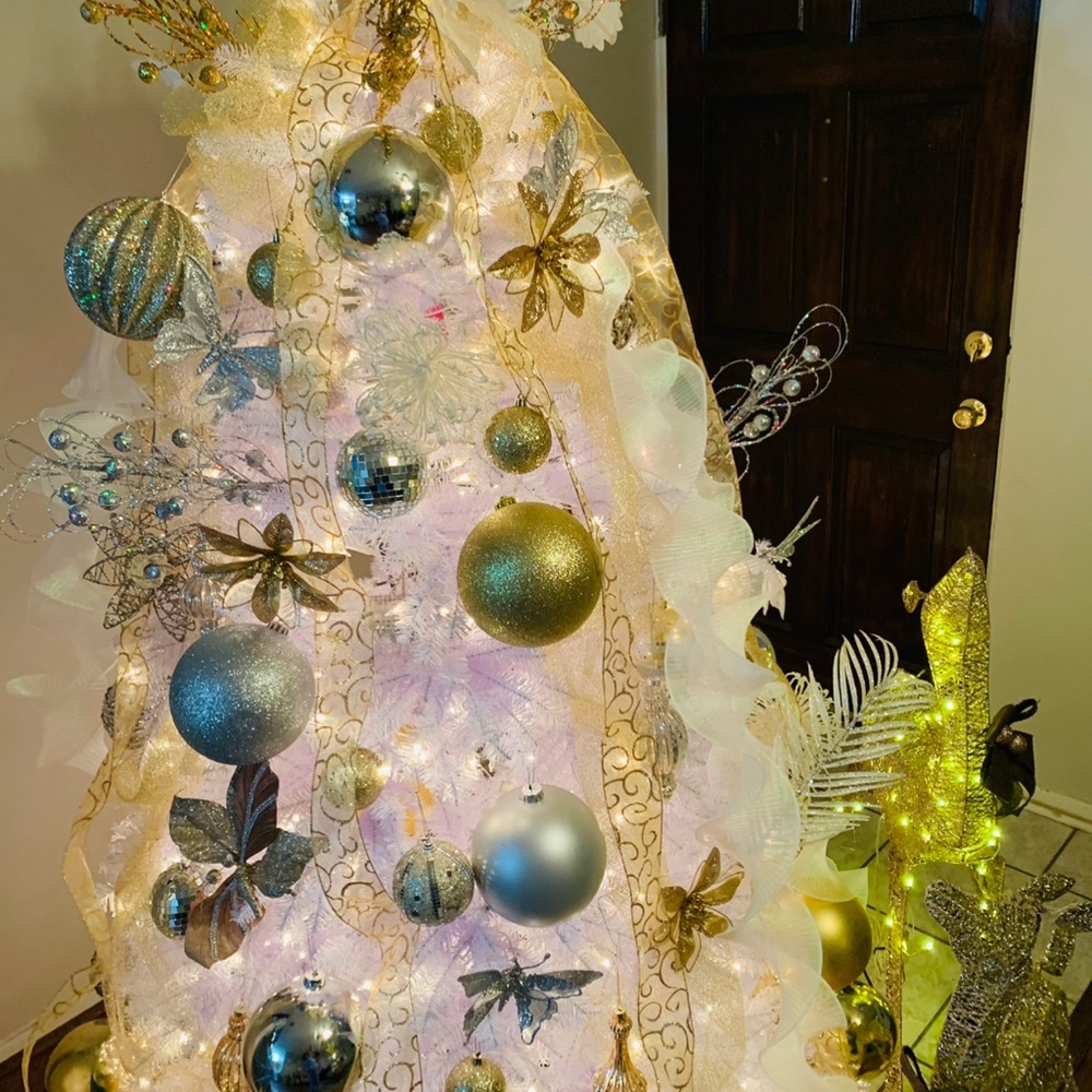 Tree with out decorations $80.00 With decoration  $120.00  1 year old